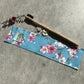 Des filles en vert -- Etui à brosse à dents motif Fleurs